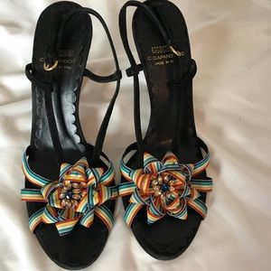 Black strappy sandals with floral grosgrain detail